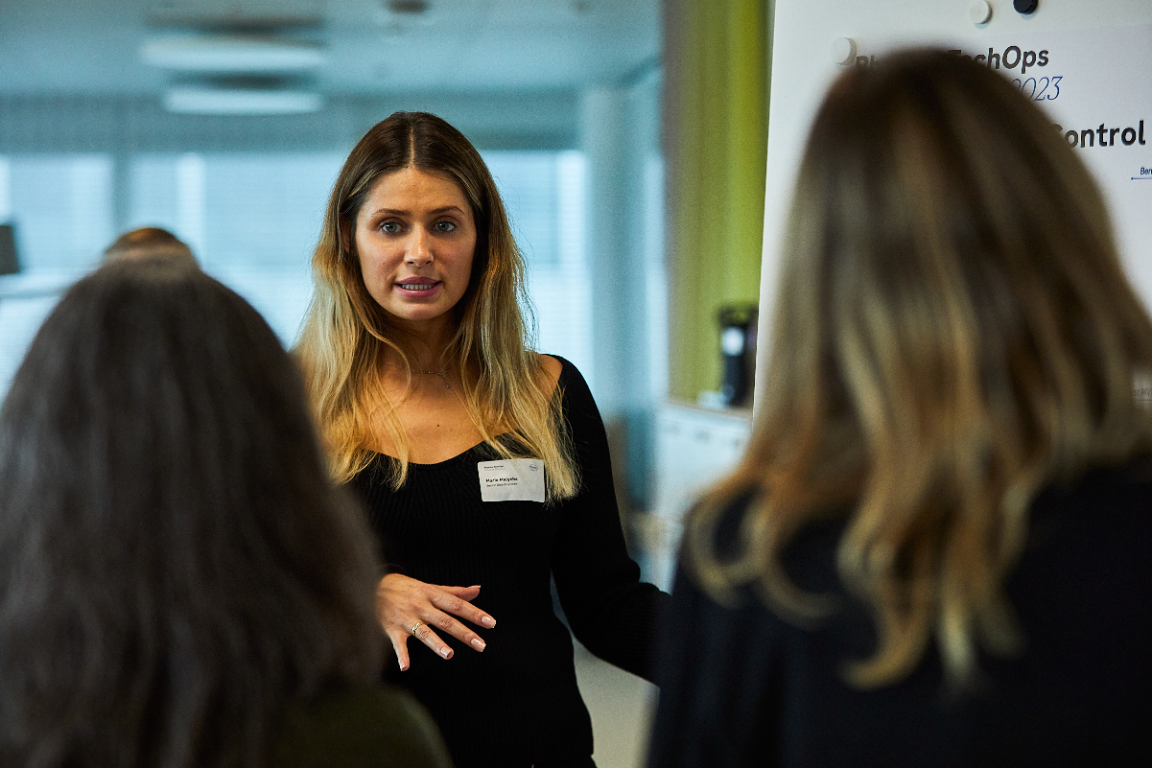 Maria presenting at a Roche event